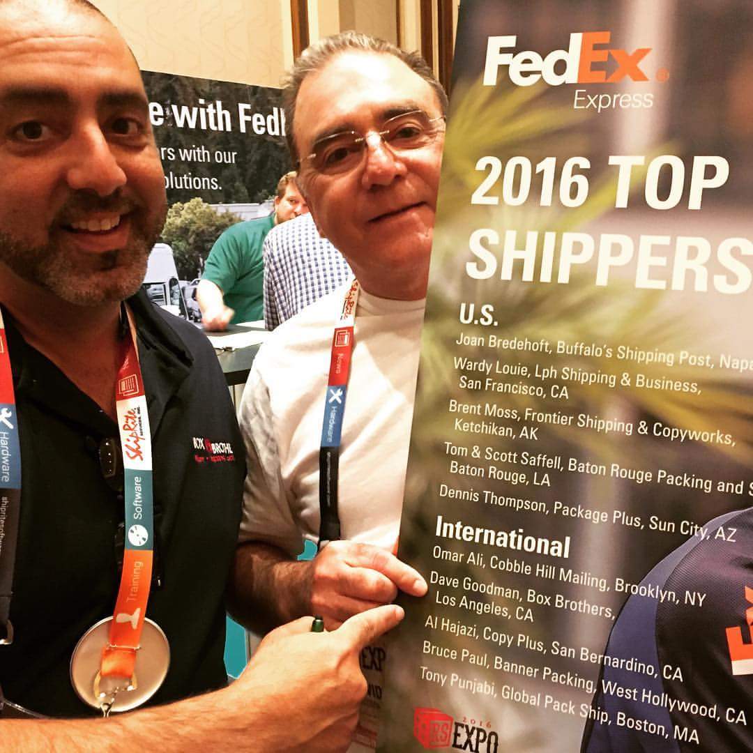 Coby and Dave getting Top Shipper Award from Fedex